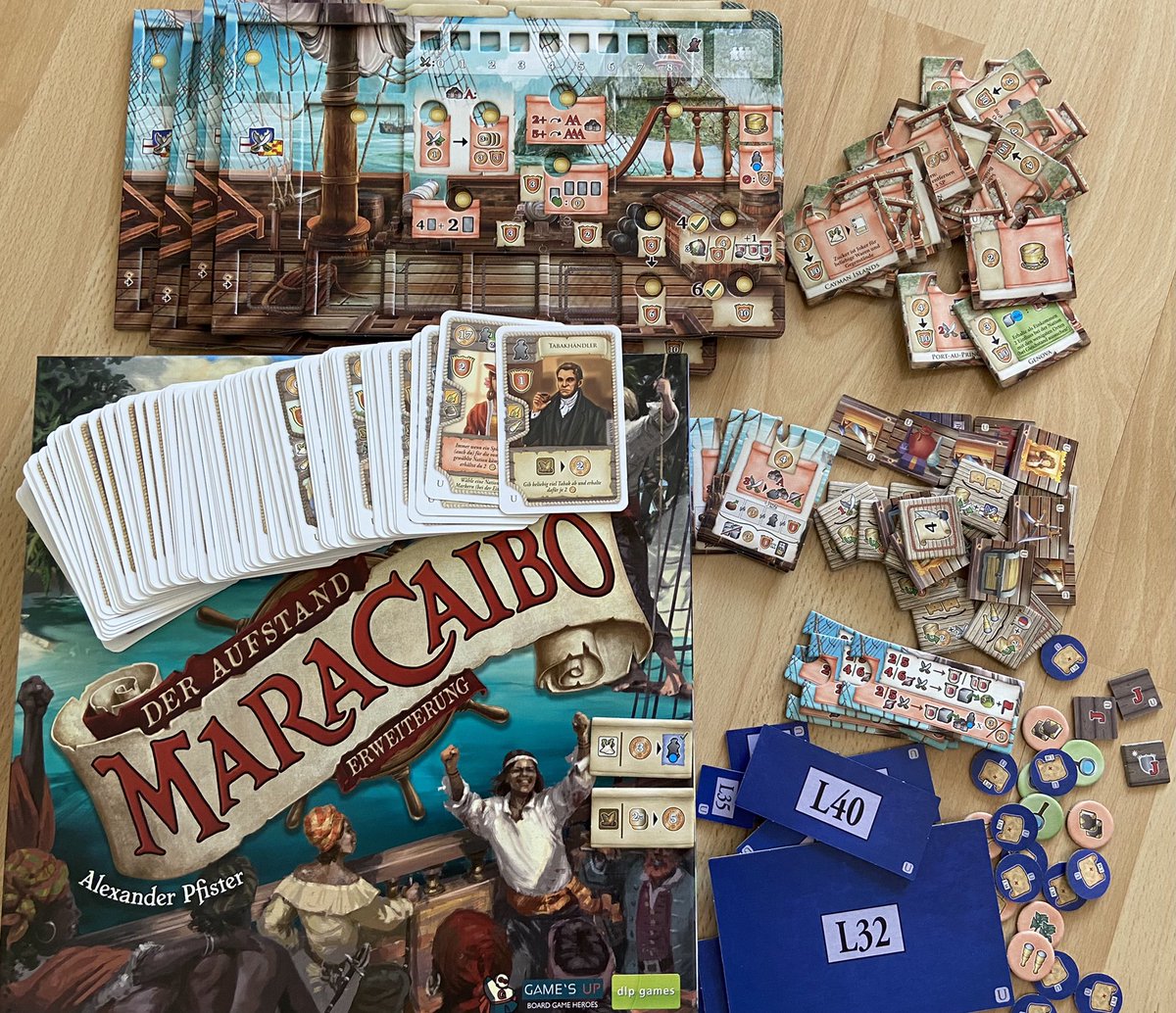 AlexxPfister's tweet photo. #MaracaiboTheUprise arrived: More cards, cities, double layered shipboards (the golden circles are not 100% centered (unlike the sample), sorry for this. But mostly they will be covered by discs), new quests and scenarios (e.g. free the Caribbean - competitively or cooperatively) https://t.co/SATWWp1Y9x