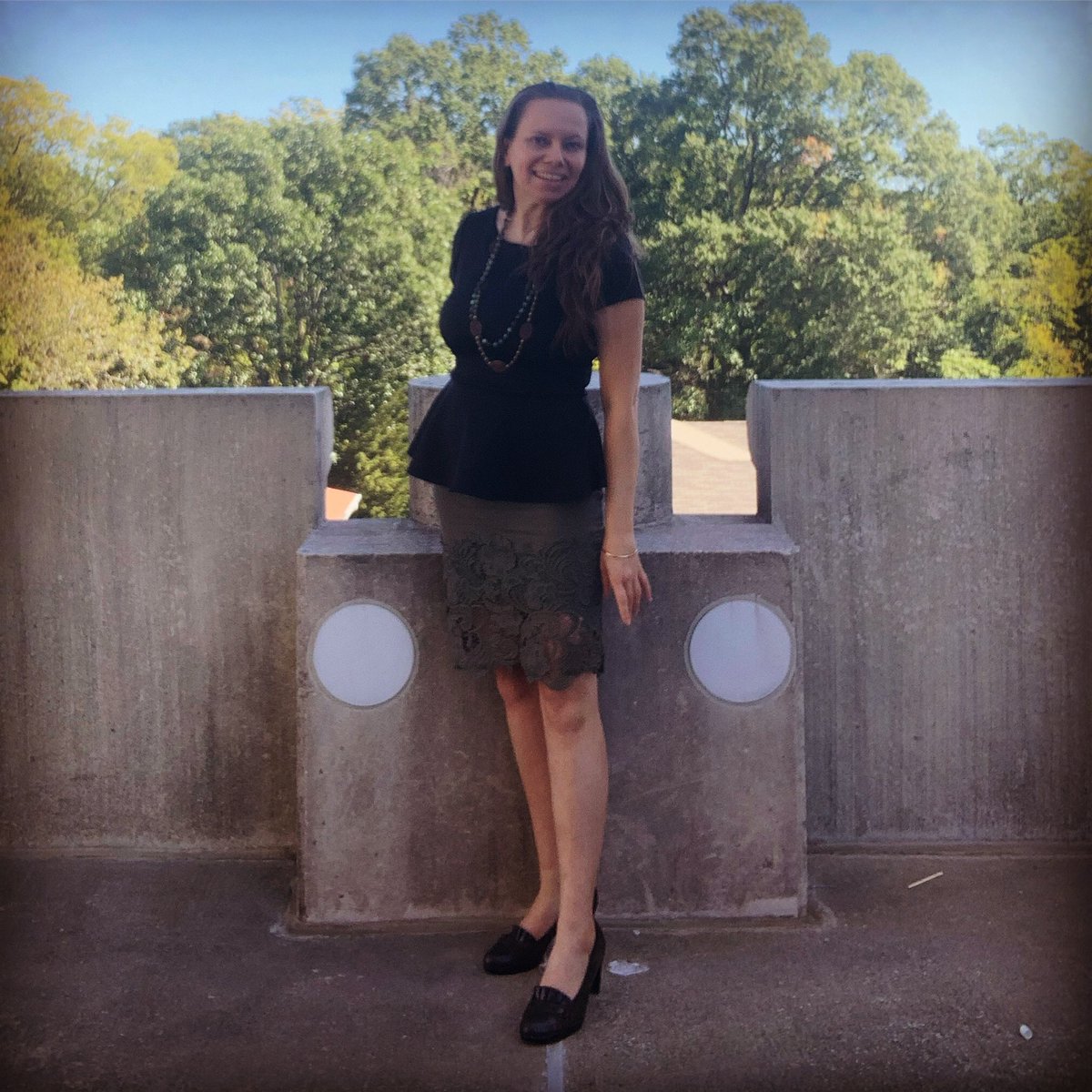 autumncarrying's tweet photo. Top o’ the McIver Street Parking Deck has unexpectedly fun bits of architecture! I feel like I’m standing between its little eyes. #pareidolia #eyes #parkingdeck #professor #beststudents #postclass #skirt #lace #sunnyday #autumn https://t.co/7IFEFJgpFc