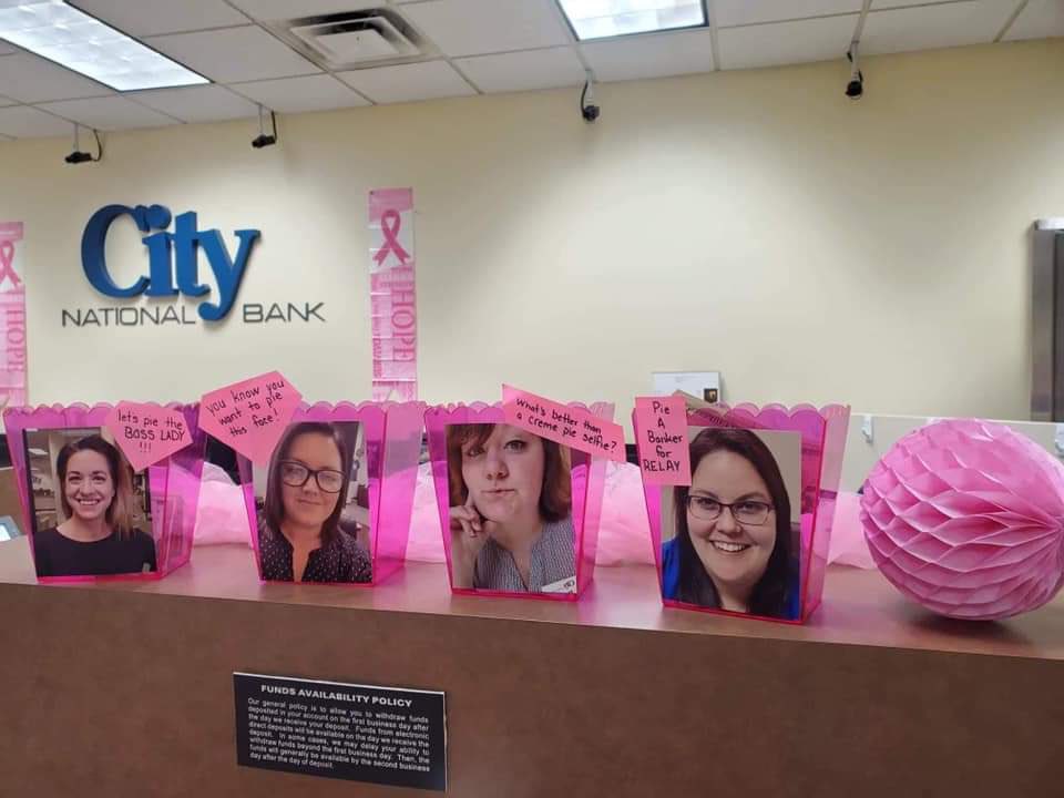BankAtCity's tweet photo. For Breast Cancer Awareness month, our Ripley WV branch is offering customers a chance to see their favorite branch employee get a pie to the face. Whoever has the most money in their bucket by the end of the month will get pied! Proceeds to benefit Jackson County Relay for Life. https://t.co/as0qhHpNwl