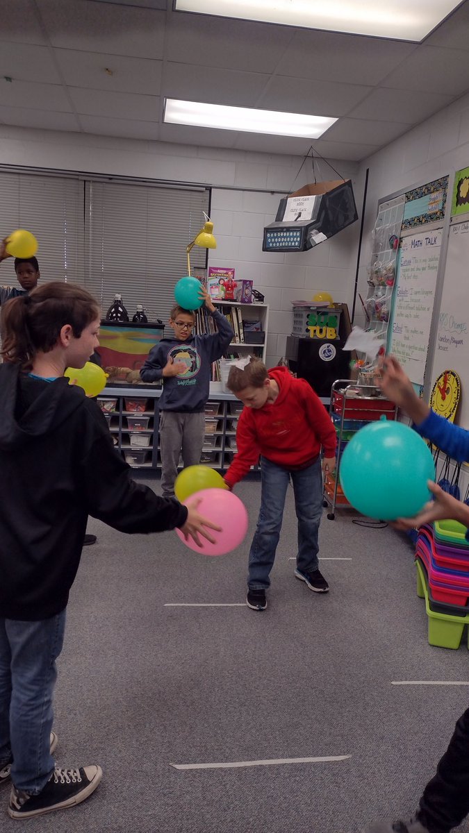 Fifth grade students exploring attraction and repulsion of charged/uncharged particles.   <a href="/SWETornadoes/">StantonWeirsdaleMCPS</a>