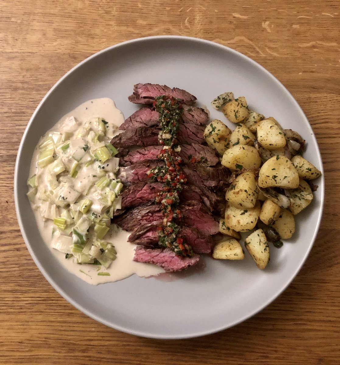 NeophyteCook's tweet photo. Bavette Steak: with lyonnaise potatoes, creamed leeks and chimichurri. https://t.co/mOSQIc3Kos