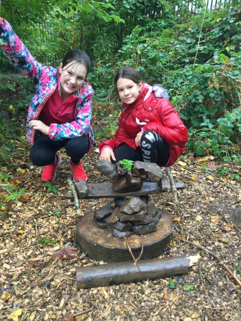 PPSMrCleaves's tweet photo. A wonderful morning in the very damp forest classroom making rock statues based on the art work of English born artist Ted Harrison who moved to the Yukon. The stone statues are Inuit statues called Inukshuk. @PPSExpresiveArt #PentrepoethProud #PPSAllaboutlearning https://t.co/LbxfWCF8vr