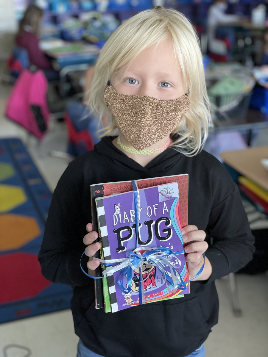 Our class had the lucky winner for 2nd grade of the PTA Book Fair raffle!  She can’t wait to read her new books! 📚