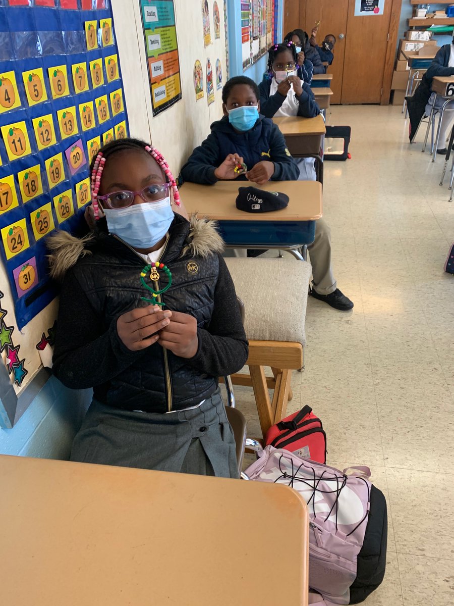 Grade4sfabx's tweet photo. Grade 4 is celebrating The Month of the Rosary by making a Rosary Bracelet to use as we pray a decade of the Rosary everyday during the month of October.@Grade4sfabx https://t.co/hpfVfMu9ft
