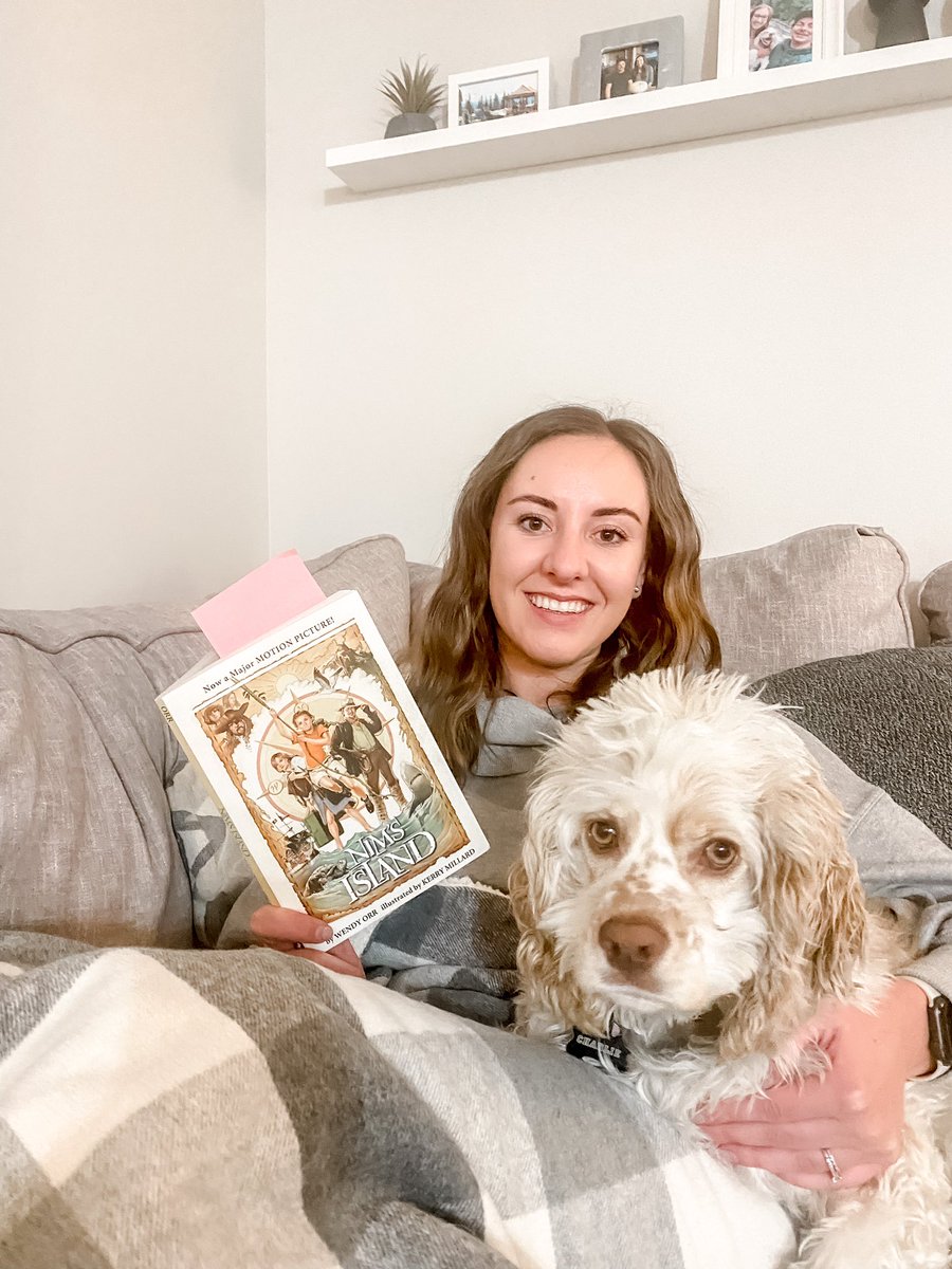 Reading Nim’s Island tonight with some Charlie cuddles! 🐶 📚 <a href="/joes4646/">St. Joseph Catholic</a> #sjcsreads