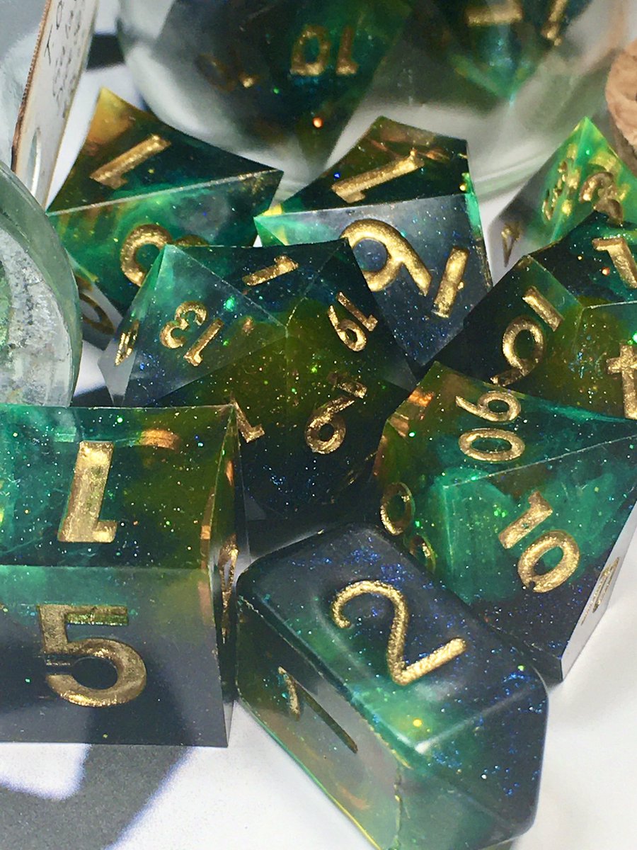 LetoAnimas's tweet photo. When I pulled this set I was cackling like a goblin. These are the T.O.N Galaxy sets (turquoise, orange and neon yellow)!!! #dice #dnd #handmadedice #resin #resinart #sharpedge #galaxy #shines #clickclacks #nerd #ttrpg https://t.co/D1E8ruDe2Z
