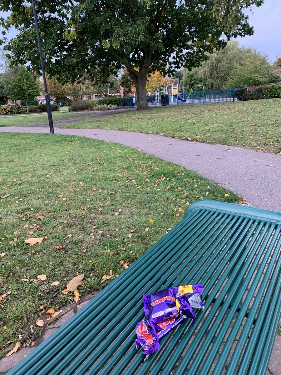 MyDoncaster's tweet photo. We’re on the lookout for whoever has INEXPLICABLY eaten one chocolate bar and left the wrapper and other three unopened bars on this park bench. 

We haven’t seen this many careless Wispas since George Michael was around. https://t.co/LUSoSQYVAV