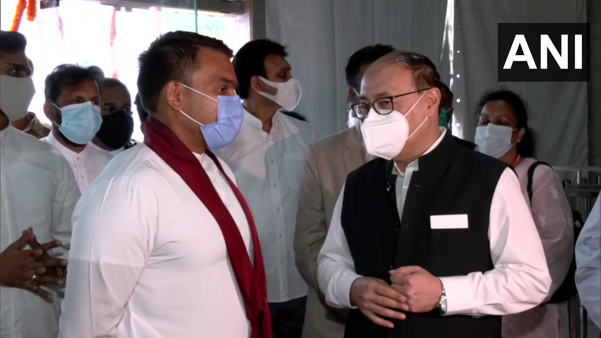 ANI's tweet photo. Foreign Secretary Harsh Vardhan Shringla receives Sri Lanka's Sports Minister and son of Sri Lankan Prime Minister Mahinda Rajapaksa at an event in UP's Kushinagar where PM Modi has inaugurated the Kushinagar International Airport. https://t.co/RSPge5aUUa