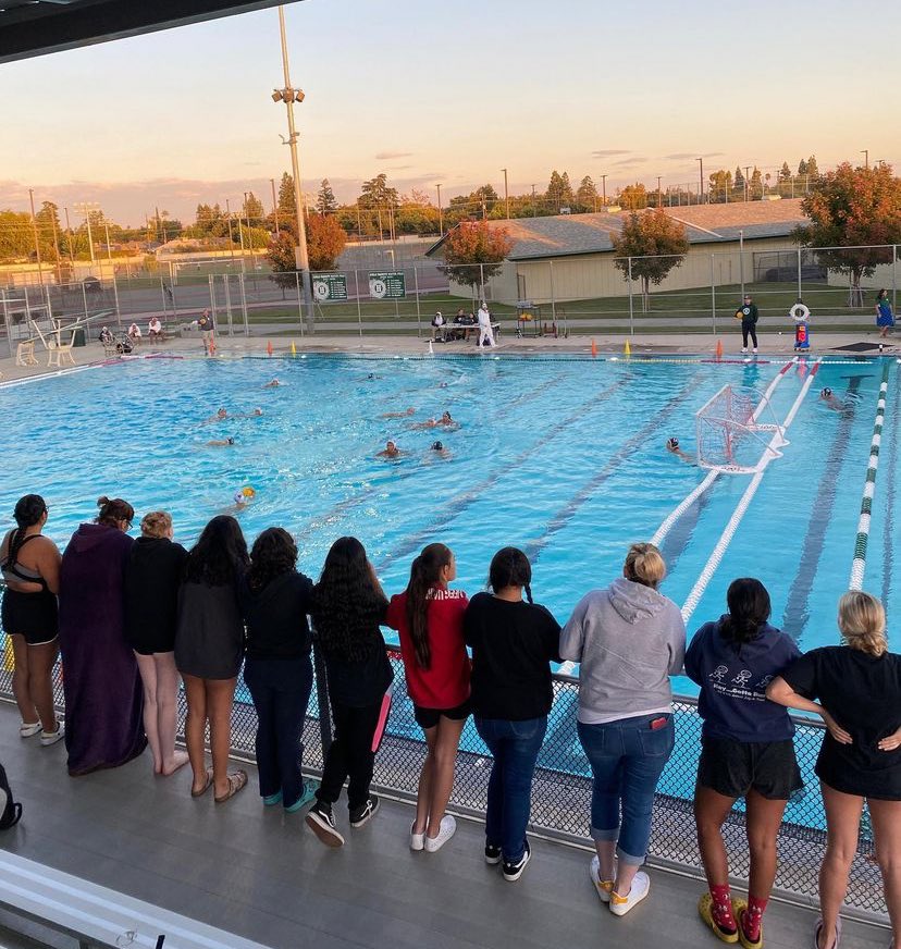 JJL002's tweet photo. One of my athletes posted this of us watching the boys water polo game. It quickly went viral among my girls, with captions relating to “my second family”. Kids of all ages have an amazing ability to remind you what matters.  Kids will always come first with me. #ilovethem https://t.co/scufcmG9OO