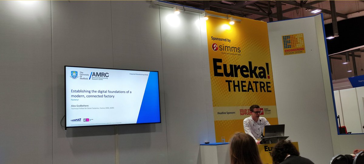 Alex Godbehere, Tech Fellow for Smart Factories <a href="/TheAMRC/">Advanced Manufacturing Research Centre</a> presenting on #Factory+ at the Engineering Design Show.