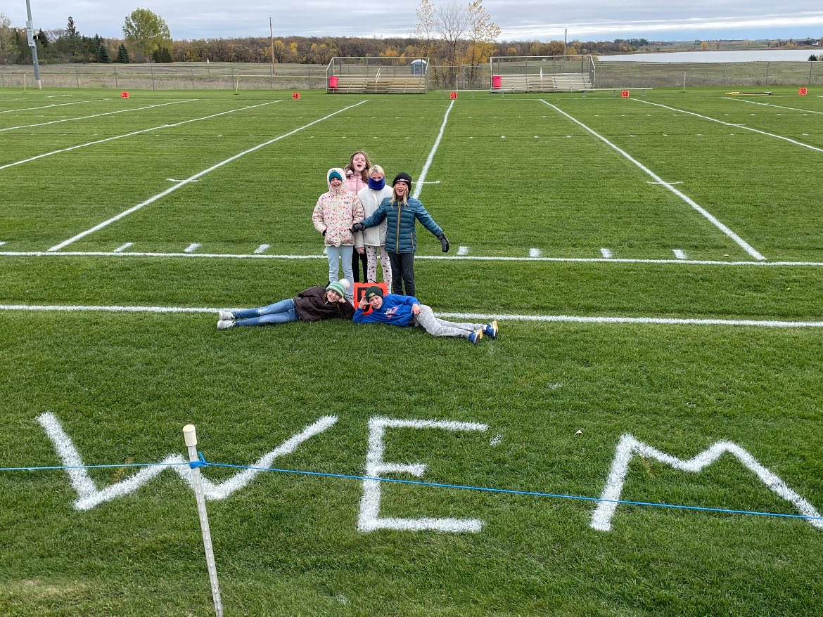 WinEMacPatriots's tweet photo. Mr. Langemo’s class begged to set the field up one more time. With only those few 5th graders they set the field up in a record 6 mins! The field is set for our battle w/ the Northern Freeze tonight. Bundle up Patriot fans. #AlwaysAGreatDayToBeAPatriot @krjbkrjmkkcq @MSHSLjohn https://t.co/CwZhmQjm3s
