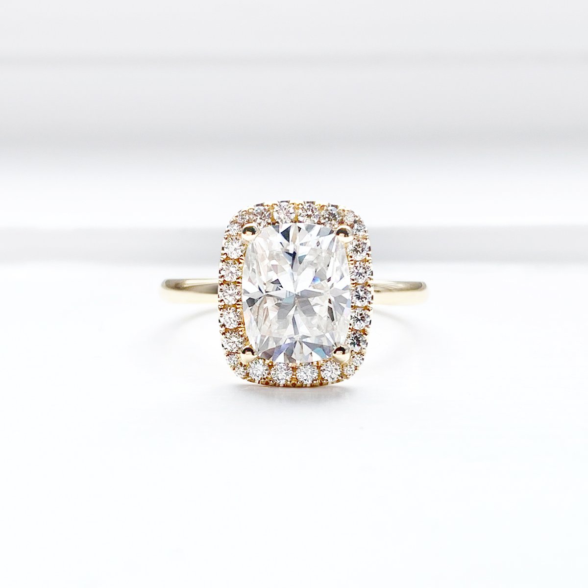DanasGoldsmith's tweet photo. Our couple's shared experience of creating her forever ring became this beautiful elongated 2.34 carat cushion cut centre stone complimented by an elegant diamond halo set in yellow gold. Let us tell YOUR story.

#designsatdanas #customdesign #customjewellery #canadianmade https://t.co/4MN07NwEs0