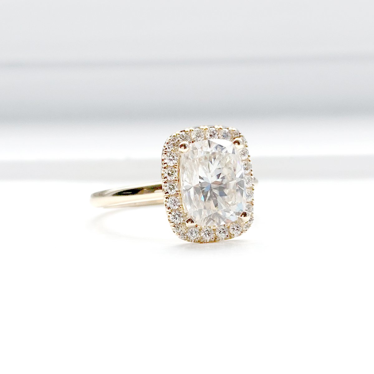 DanasGoldsmith's tweet photo. Our couple's shared experience of creating her forever ring became this beautiful elongated 2.34 carat cushion cut centre stone complimented by an elegant diamond halo set in yellow gold. Let us tell YOUR story.

#designsatdanas #customdesign #customjewellery #canadianmade https://t.co/4MN07NwEs0