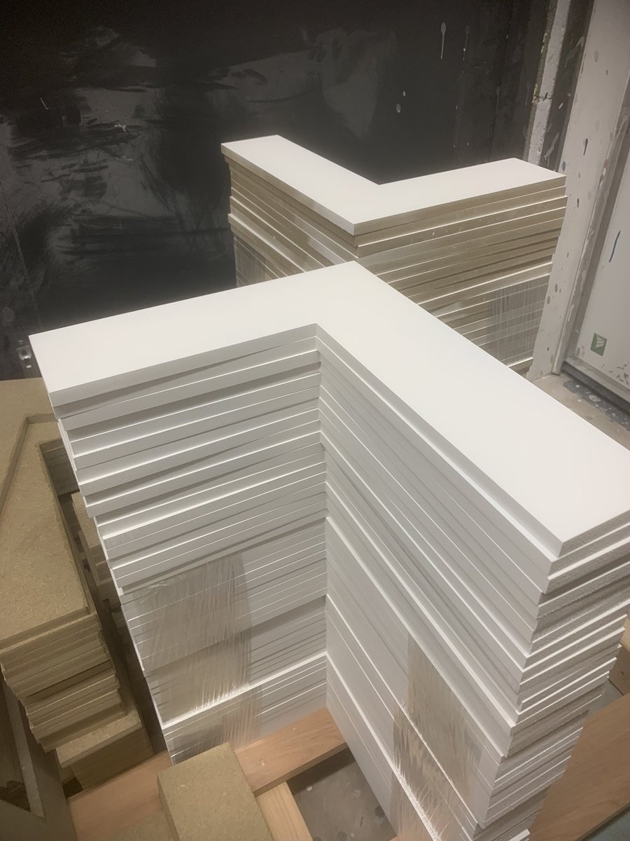 Priming lots of ‘L’ shapes in MR MDF today - best part of 700 total #joinery #spraying