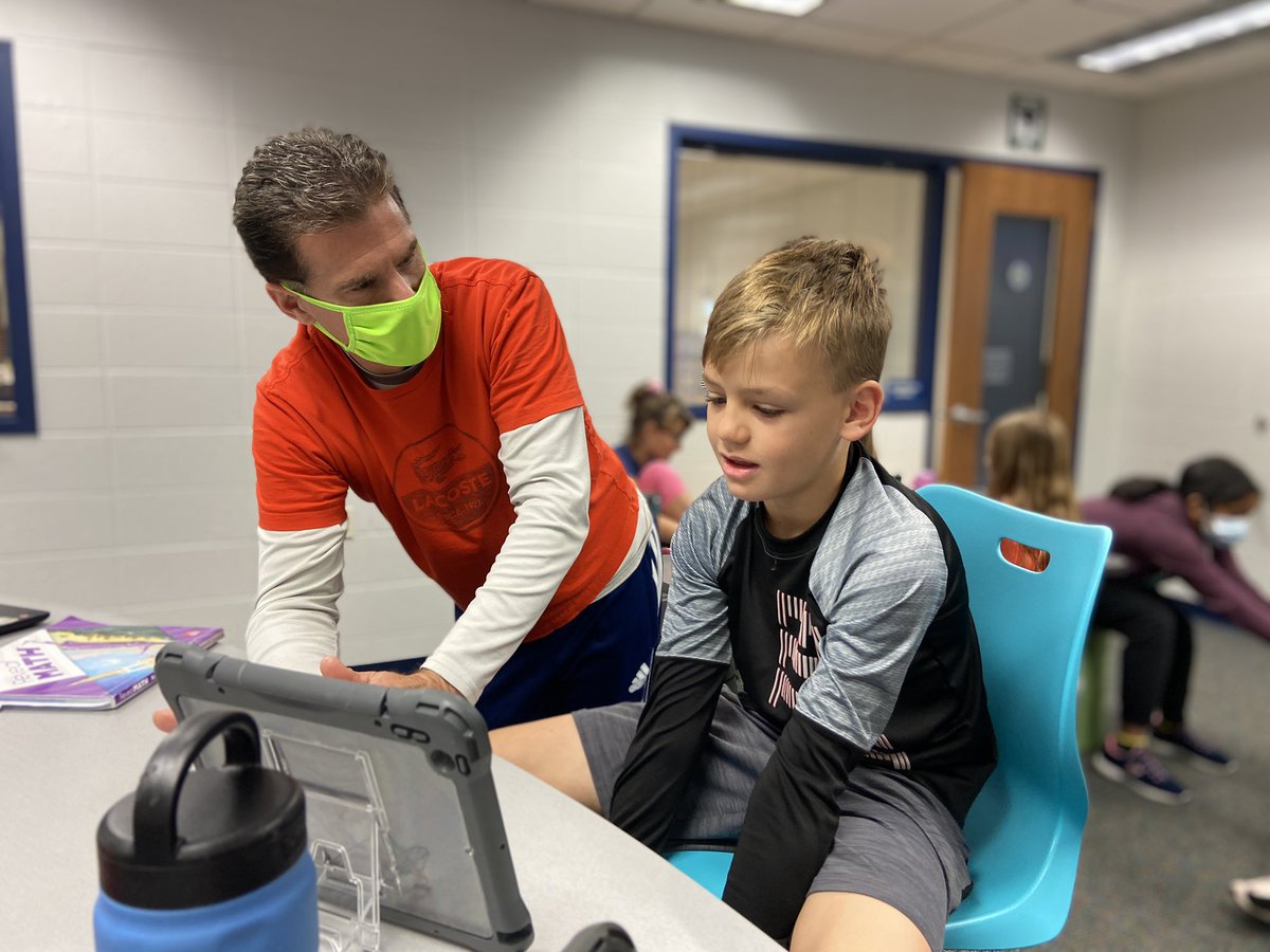 SchlieReed's tweet photo. @ElmwoodSDNB 5th graders work on earning their graphic visionary maker learning badge creating infographics  with Mr. Slonac, sharing their work with Principal Veal @SDNBSchools #SDNBLearns @Haebig https://t.co/R5x2chEfGm