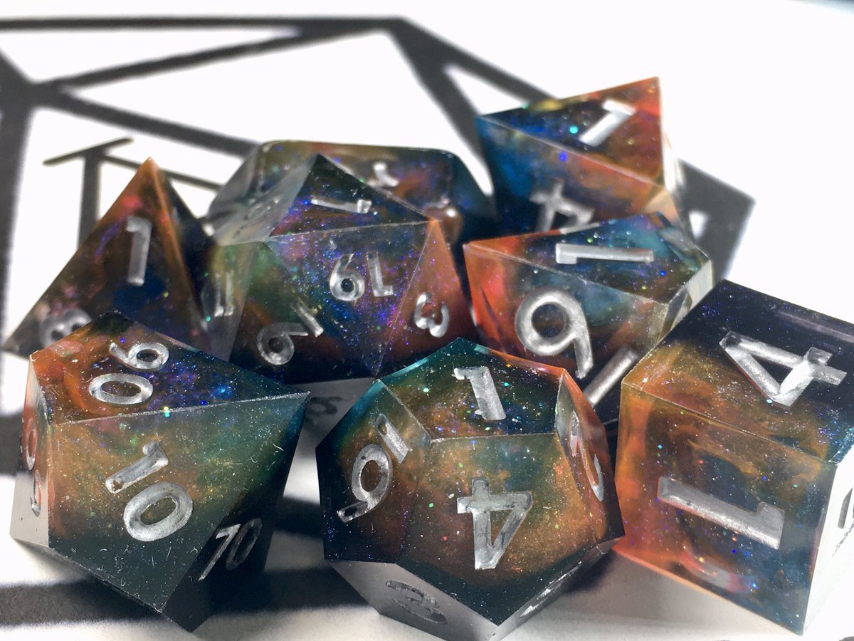LetoAnimas's tweet photo. B.Y.R1 Galaxy dice set! Only one of the two sets poured really turned out great, so here’s pics of that one! #dice #handmadedice #dnd #nerd #galaxy #sharpedge #resin #resinart #shinies https://t.co/g0uuHwn5w2