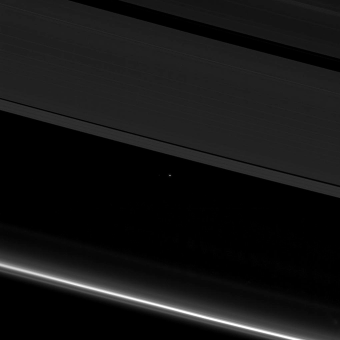 konstructivizm's tweet photo. That dot is you. That dot is Earth. A mote of dust, suspended between the rings of Saturn, photographed by the Cassini spacecraft at a distance of 1.4 billion kilometers. https://t.co/syL0S0yNQ4