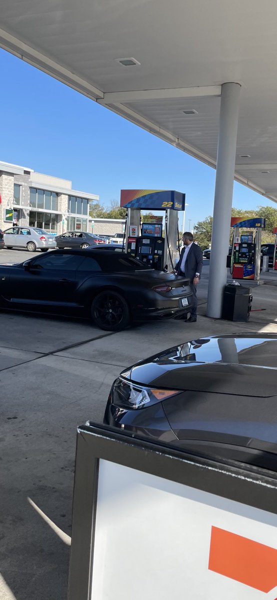 My dad knowing I love cars sent me this picture saying "You like this one?" 
When in reality he was seeing how long it would take me to see who's filling it up.