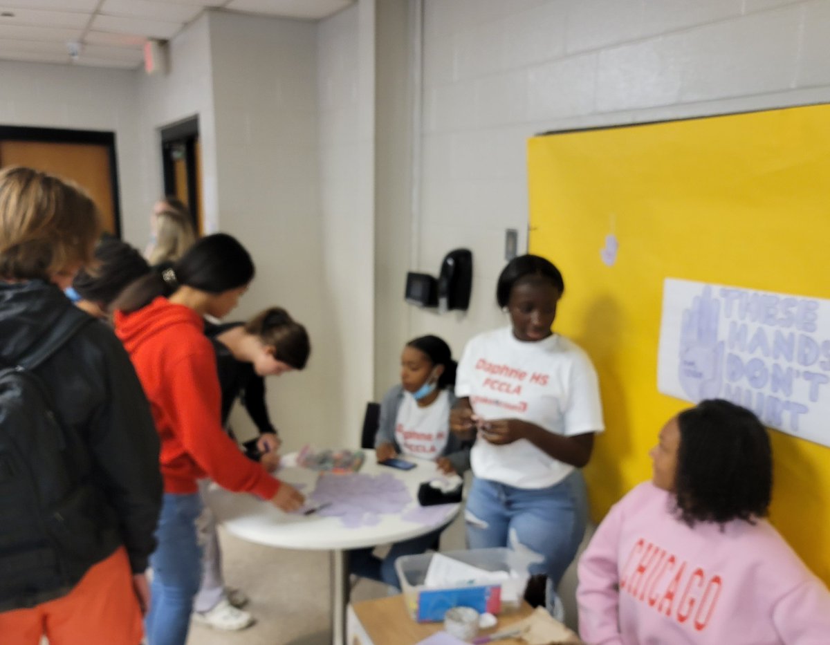 collum_k's tweet photo. Daphne's FCCLA officers helped students to pledge to take action against domestic violence.  These hands don't hurt pledge was signed by students today at Daphne.  October is Domestic Violence Awareness Month and FCCLA helped students learn about this today during the lunch waves https://t.co/EvPoEJ05Jy