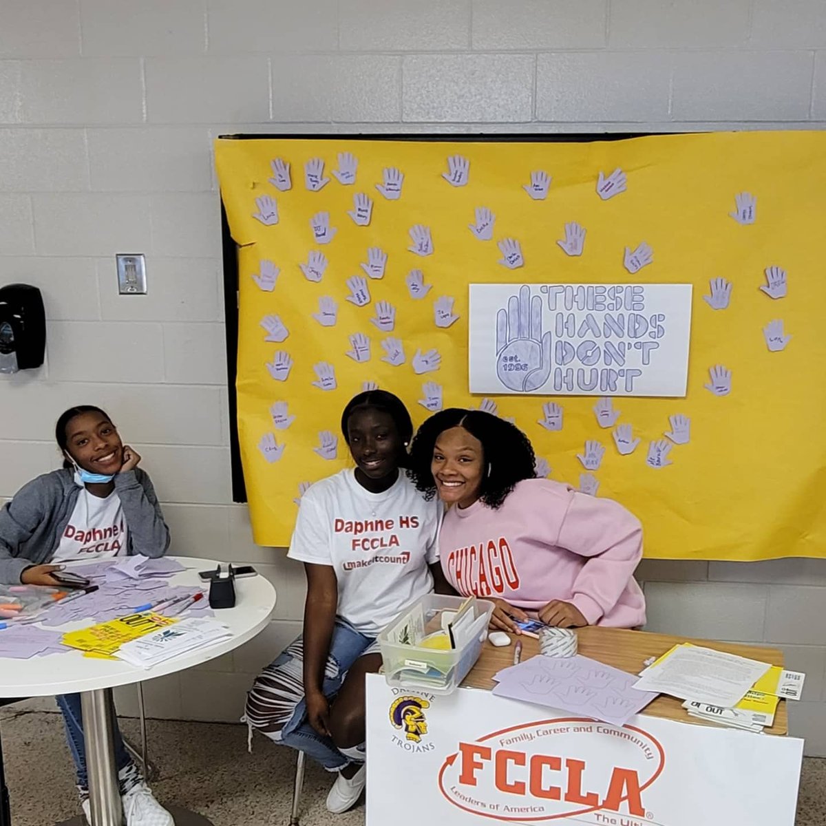 collum_k's tweet photo. Daphne's FCCLA officers helped students to pledge to take action against domestic violence.  These hands don't hurt pledge was signed by students today at Daphne.  October is Domestic Violence Awareness Month and FCCLA helped students learn about this today during the lunch waves https://t.co/EvPoEJ05Jy