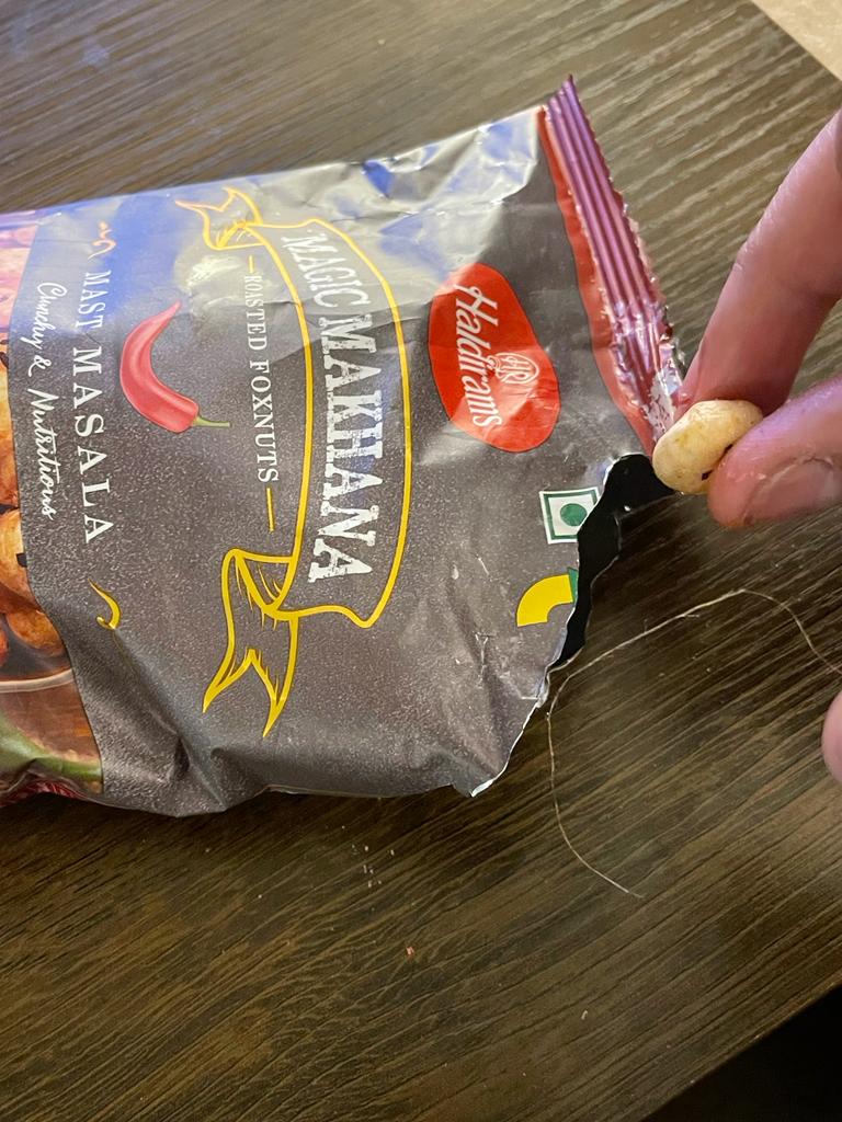 LogicalKandi's tweet photo. @HaldiramSnacks Found a hair in the Magic Makhana packet!!!! This is very poor quality control and unhygienic especially in this pandemic time! Would advise everyone to stop getting their products! https://t.co/DRk0LI1bqx