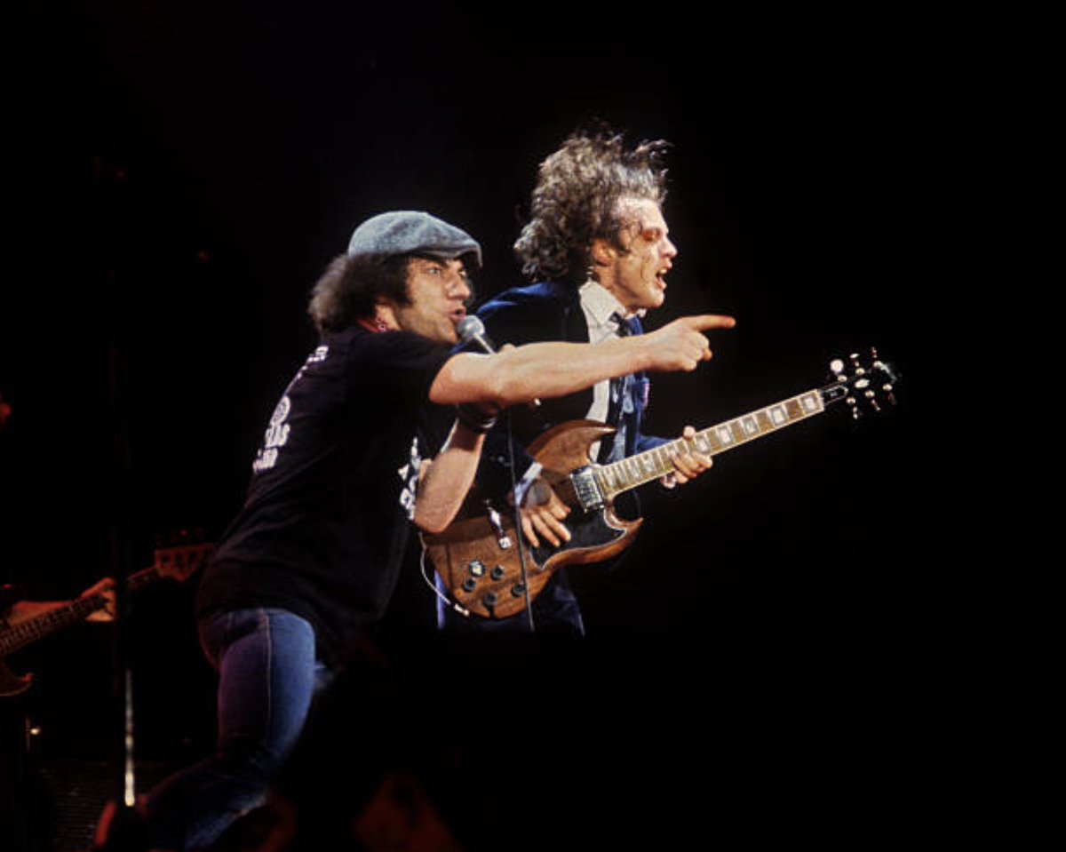 Brian Johnson and Angus Young performing onstage with AC/DC at the Cow Palace in San Francisco, California on February 16, 1982