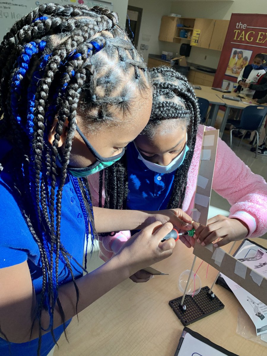 TAGMsRackston's tweet photo. My 5th graders working hard to build the windmill at @APSTAGAcademy #STEMtopia180 @GetTeacherGeek Friday 2nd grades doing #wigglebots @TAGThinkTank 🏠 https://t.co/PSwpWJ9x7D