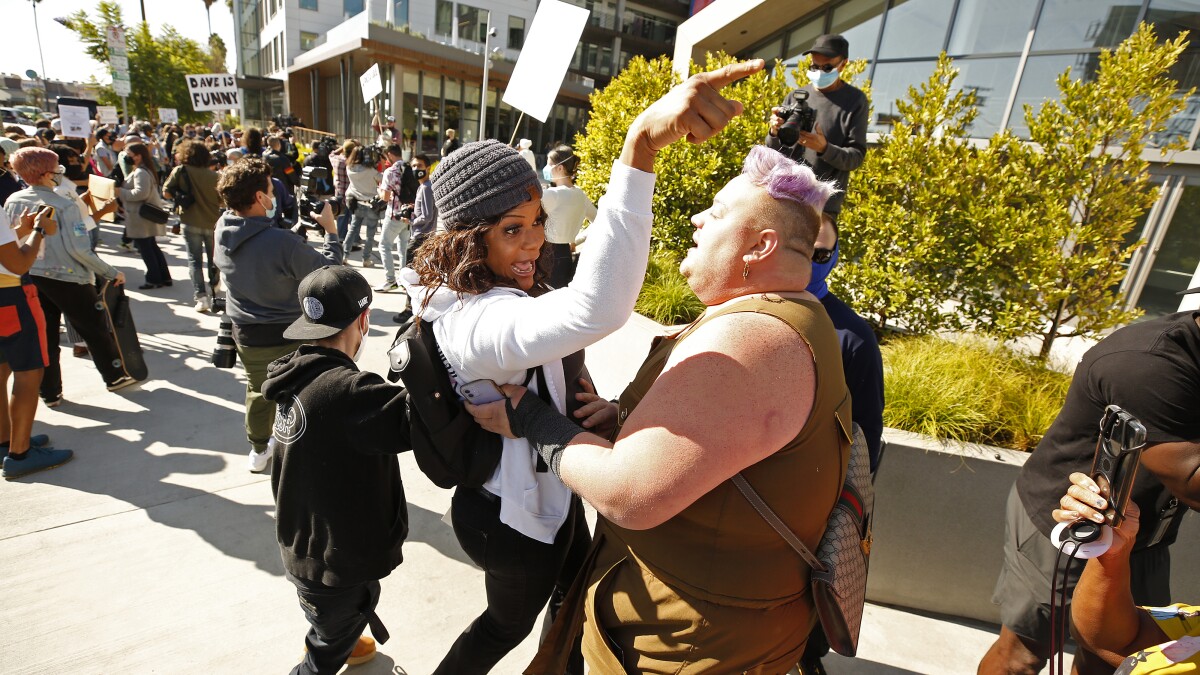 Photos: Netflix employees walk out in protest of Chappelle comedy special, transphobic remarks latimes.com/entertainment-… via <a href="/latimesent/">LAT Entertainment</a> #LosAngeles #news