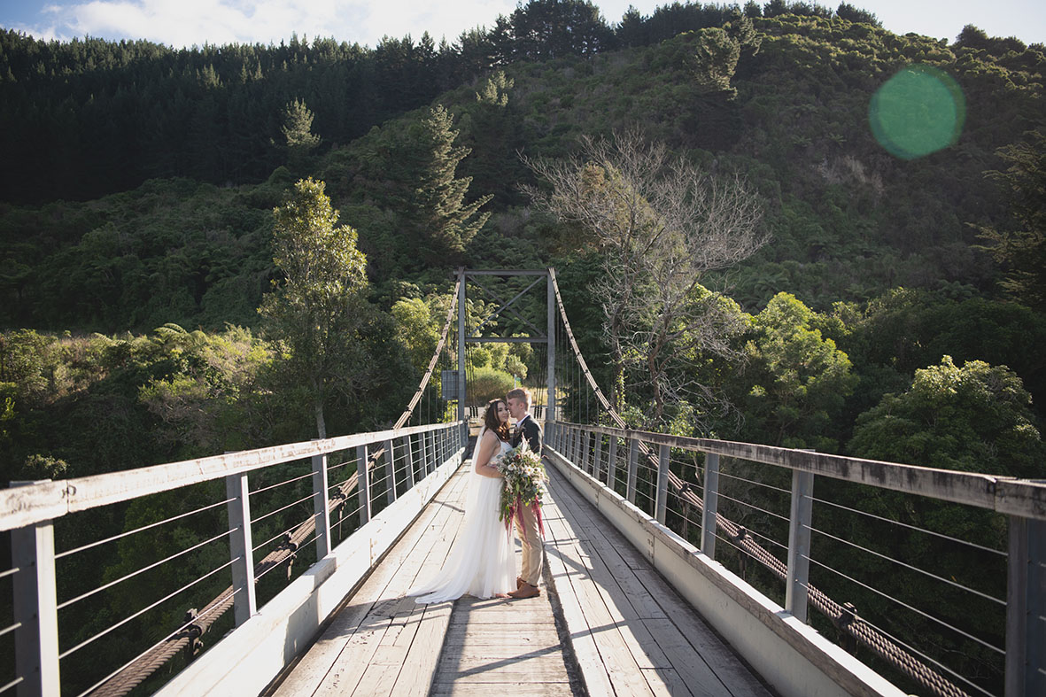 photographernz's tweet photo. I'm not a massive fan of heights and this beautiful little bridge was HIGH! But anything for the photo right? (well almost anything) 
With the gorgeous Olivia &amp; Levi. https://t.co/hpuoio6ukM