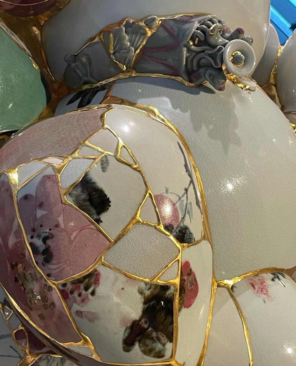 seetheTEN's tweet photo. Ten in Valentino's Resignify Part 2 in Beijing, 2021 // Translated Vase #2 by Yee Sookyung, 2014 

destroyed pots put back together, covering the cracks in gold to highlight that breakage and find beauty in the midst of ruins https://t.co/iTxxESJZ4K