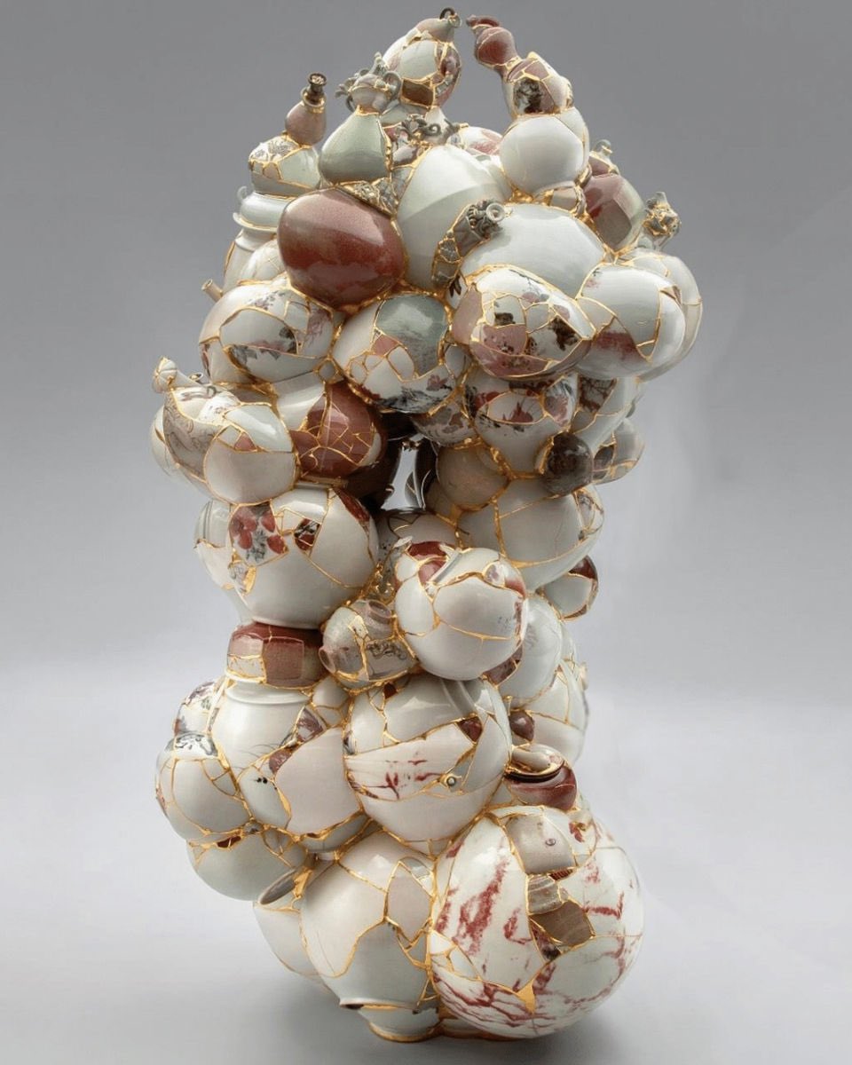 seetheTEN's tweet photo. Ten in Valentino's Resignify Part 2 in Beijing, 2021 // Translated Vase #2 by Yee Sookyung, 2014 

destroyed pots put back together, covering the cracks in gold to highlight that breakage and find beauty in the midst of ruins https://t.co/iTxxESJZ4K