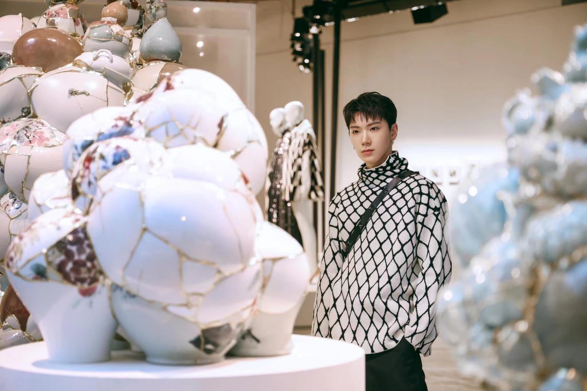 seetheTEN's tweet photo. Ten in Valentino's Resignify Part 2 in Beijing, 2021 // Translated Vase #2 by Yee Sookyung, 2014 

destroyed pots put back together, covering the cracks in gold to highlight that breakage and find beauty in the midst of ruins https://t.co/iTxxESJZ4K