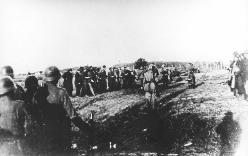 Nik_Ilic's tweet photo. 80 years ago, following an attack that killed 10 and wounded 26 Nazi soldiers, 2,794 Serbian civilians - including 144 school boys were executed in Kragujevac.  The picture of the boys holding hands with their teacher is heartbreaking.  The resistance continued.  Rest in Peace. https://t.co/d2qo10ROK3