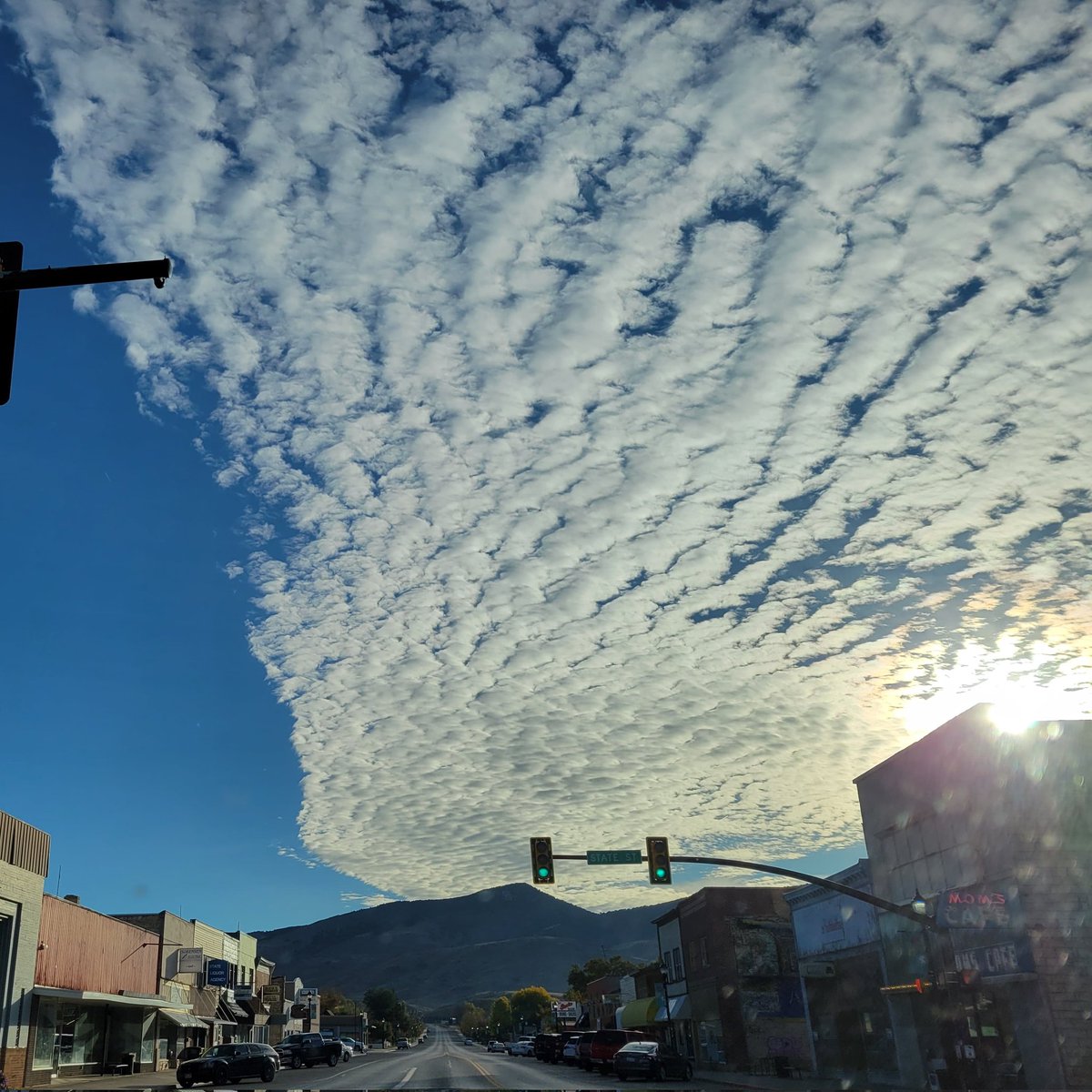 iviejes23's tweet photo. Check out these altocumulus clouds hanging around town this morning. What do you notice and wonder about this phenomenon? #ignorethedirtywindshield #cloudidentification #meteorology #phenomenon #scienceisbeautiful #earthscienceteacher https://t.co/30YX90Z6PD