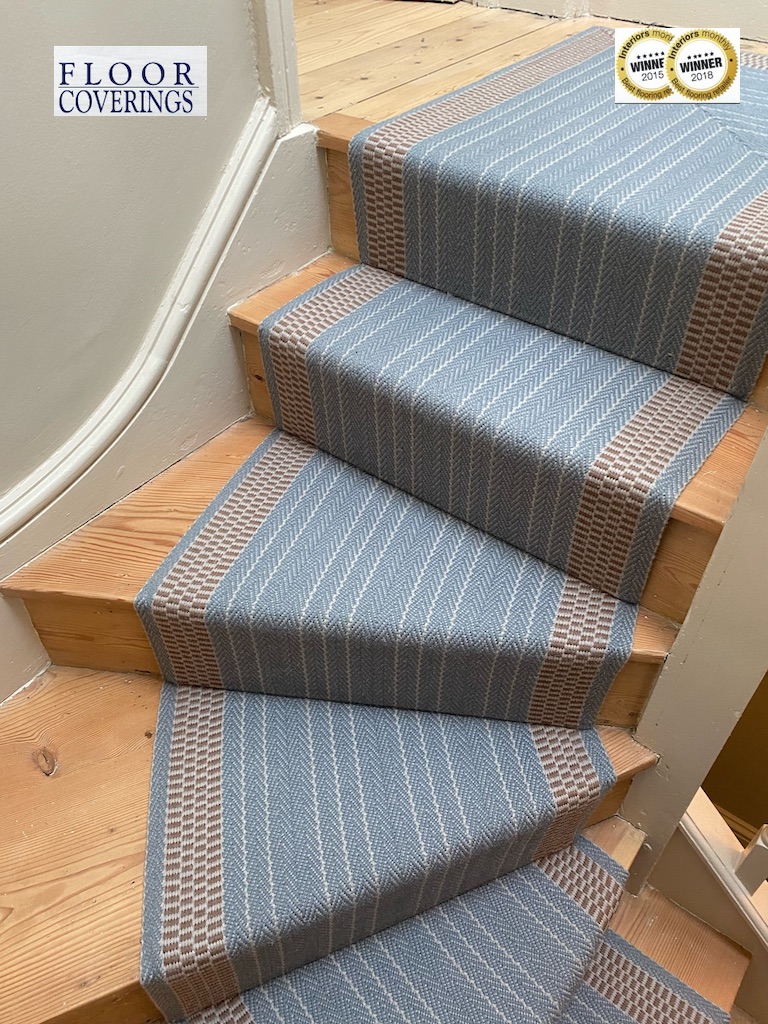 This was a beautiful installation by our fabulous team.  A bespoke Roger Oates runner on the stairs and landings in this stunning home. You'll see the stripes follow the curvature of the stairwell.  Handstitched mitres for joins. Picture perfect.  #unique #flooring #stairs #rugs