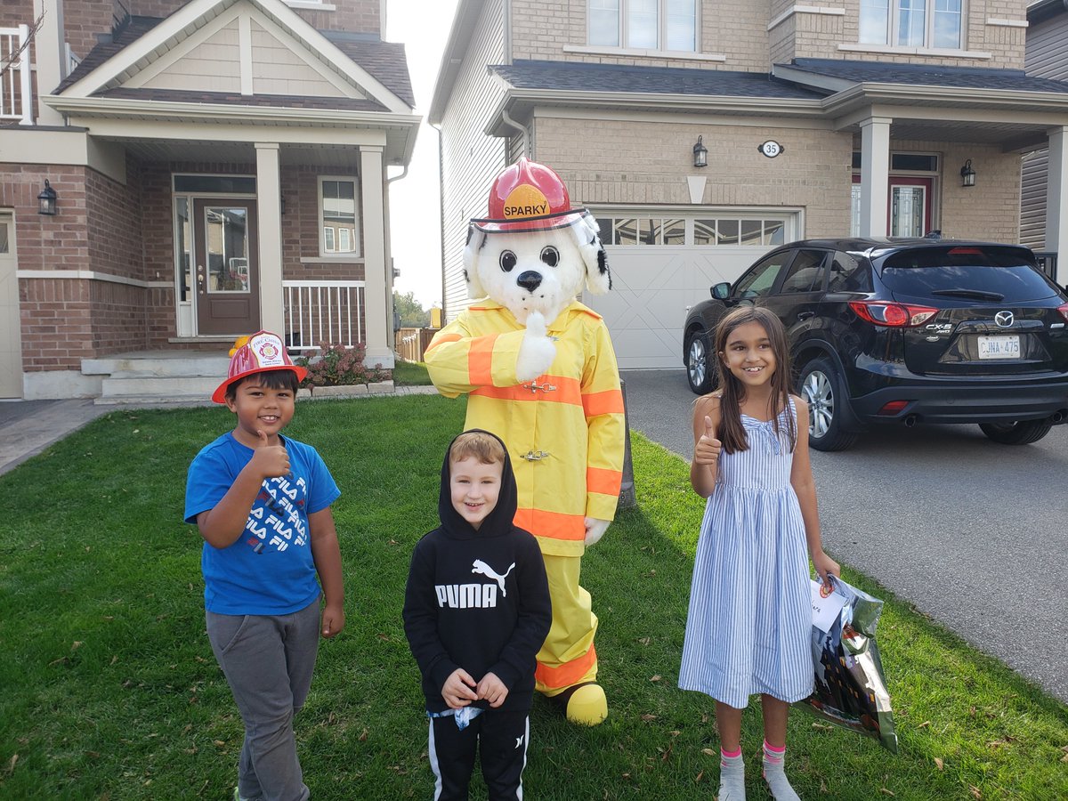 CentrWellington's tweet photo. If you saw a #CWFire truck with a large dog in it last night, no you were not going crazy! Fire Prevention Officer Chris and his trusty side-kick Sparky the Fire Dog were out dropping off prizes for our Prevention Week colouring contest winners! Thanks to all who submitted! https://t.co/t0gVevsysV