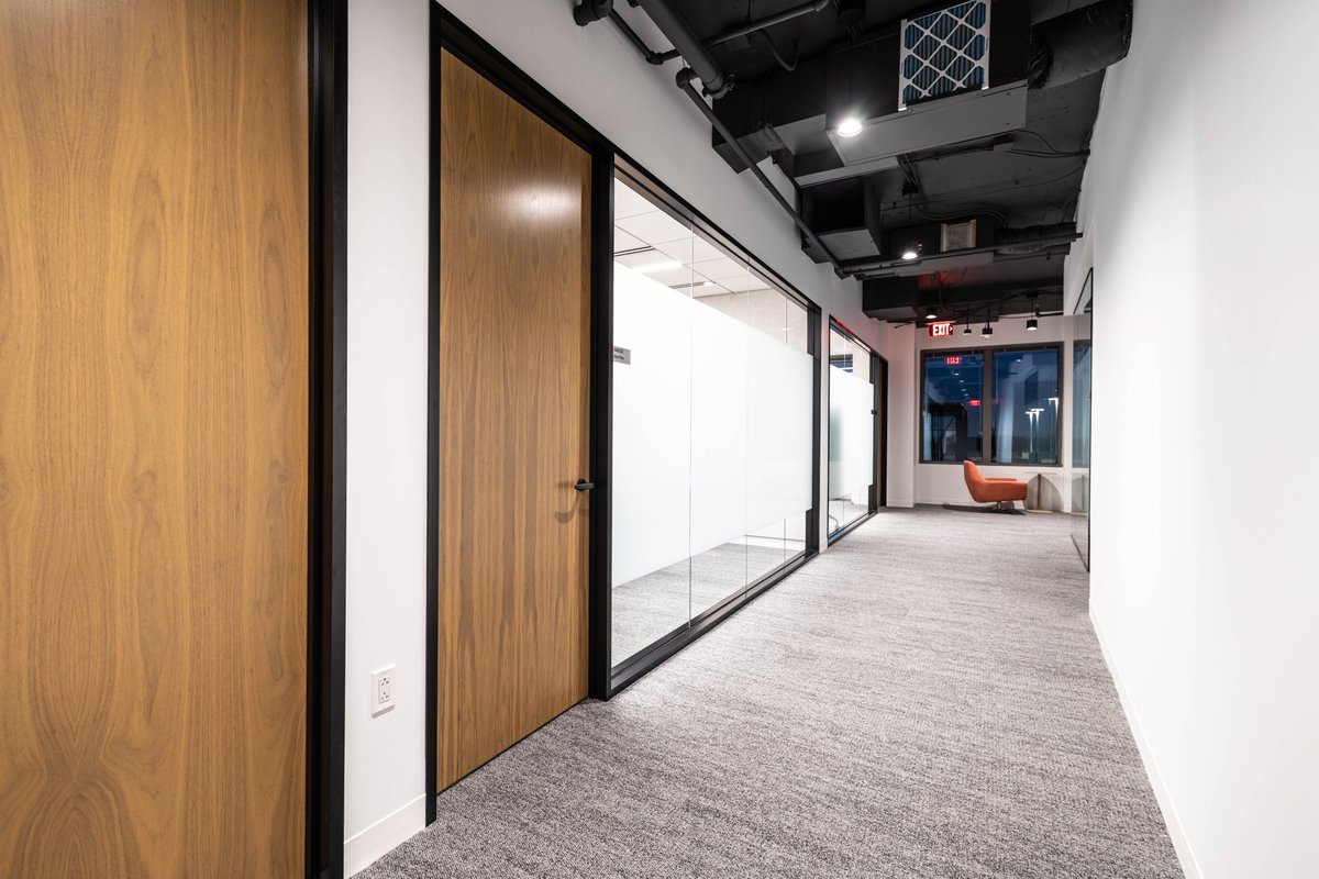 ComdorLLC's tweet photo. Black frames with veneer doors has become pretty common!  This space turned out incredible!  @HITTContracting https://t.co/iMO1HHz89E