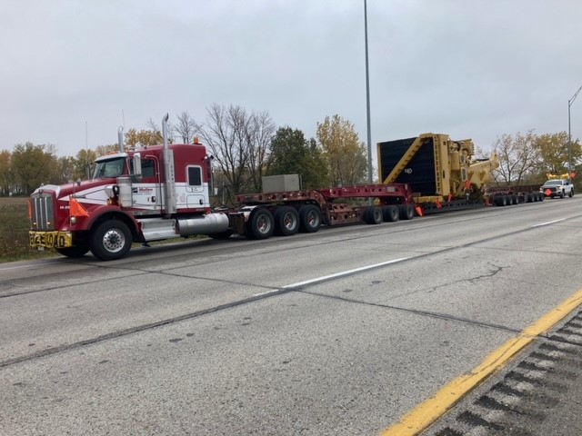 Mullen Unit 14001- Jimmy the "rock" . - loaded  with a 797 Chassis on a 13 axle trailer - 142' long /13' plus wide / 14'8" high  &amp;   230,000#'s  -Decatur Ill to Ft Mac.  

#Mullentruckingcorp #heavyhauling  #ourlifeisthehighway #kenworthtrucks #superloads #caterpillar#bigtrucks