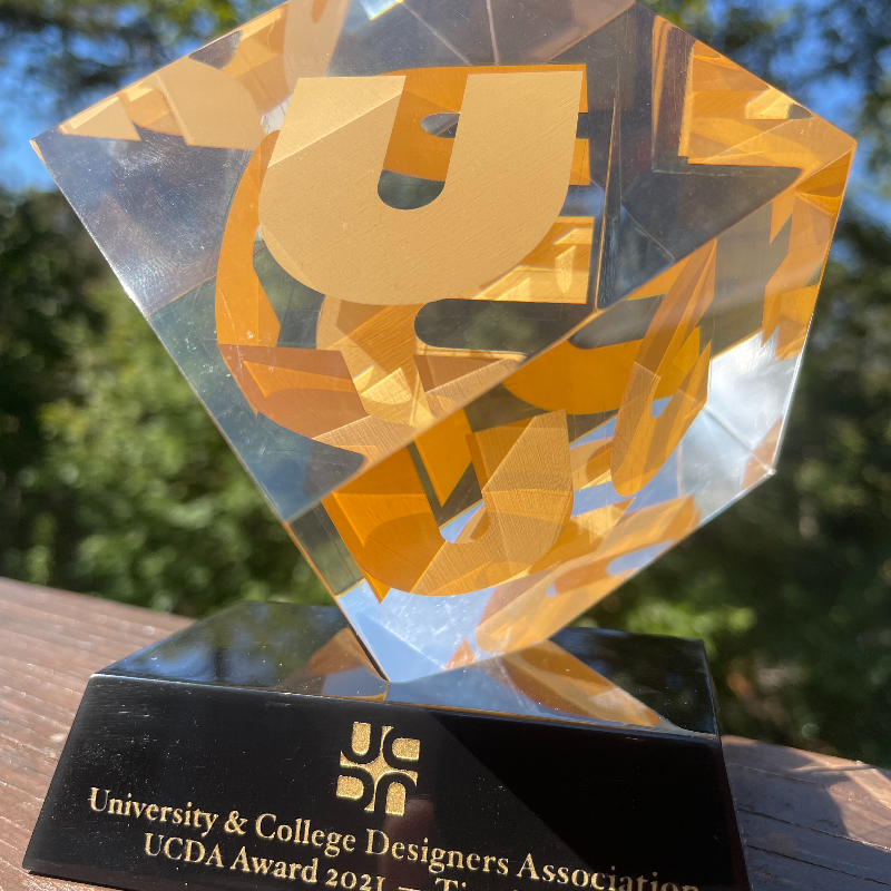 ClemsonSA's tweet photo. NEWS: Tina LeMay, director of Clemson's Student Affairs Publications and two-time Clemson alumna, was named the 2021 recipient for the University & College Designers Association Award! We are so excited and proud of her work! Read more ⬇️ #ExperienceSuccess