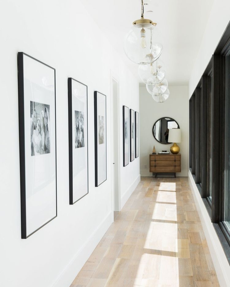 BlancheGarcia's tweet photo. I simply love this hall. The minimalist gallery wall, the gorgeous lighting, and the stain of the floor make it look so effortlessly pretty.
Design by | @studiomcgee
.
.
.
#bgarciadesigns #blanchegarcia #design #interiordesign #homedecor #modern #designer #showmeyourstyle #mi https://t.co/Vfw4fUN1PH