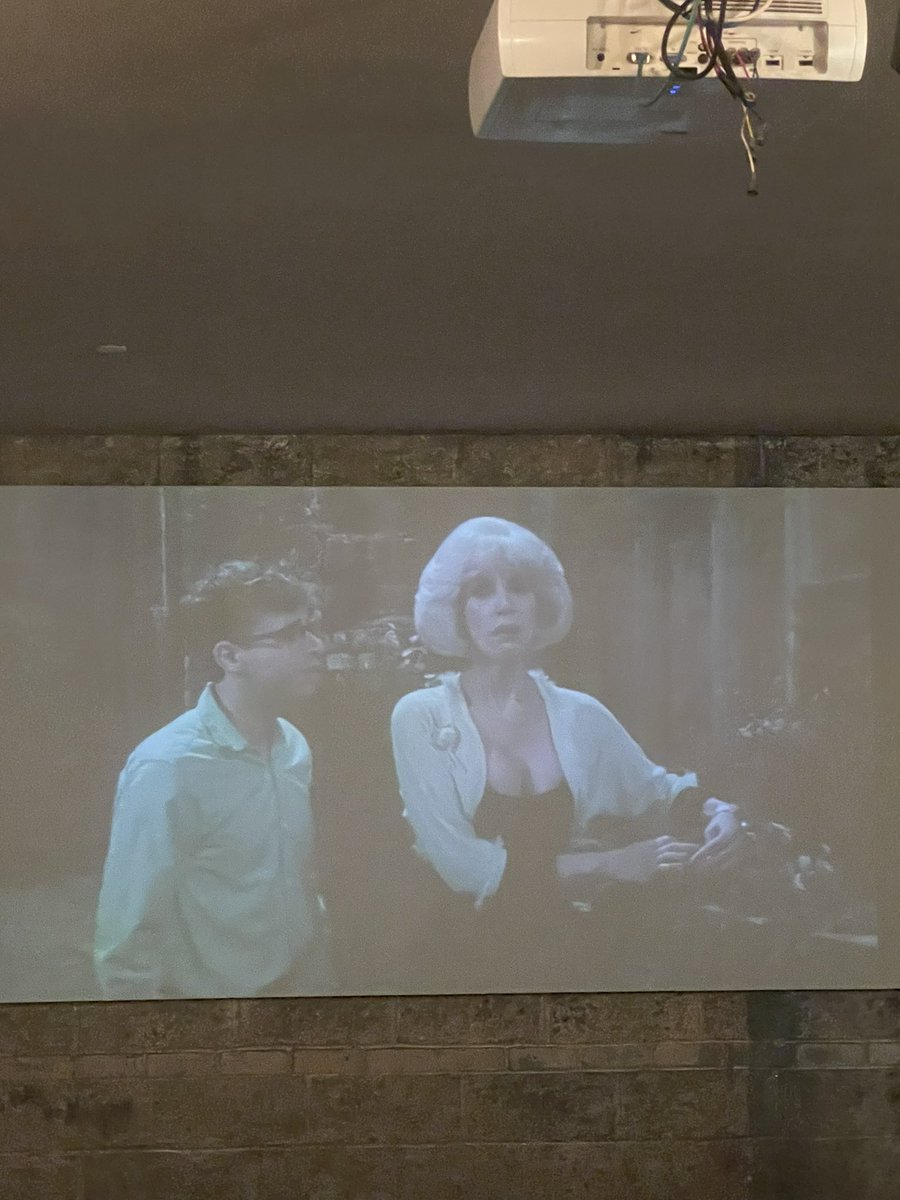 TopKvlt's tweet photo. Raise your hand if you feel personally attacked by @nitehawkcinema showing Little Shop in the lobby on your way out from closing night of @BrooklynHorror. It’s almost like you’re trying to get us to go downstairs and drink more at Lo-Res! https://t.co/uI0ba642GK