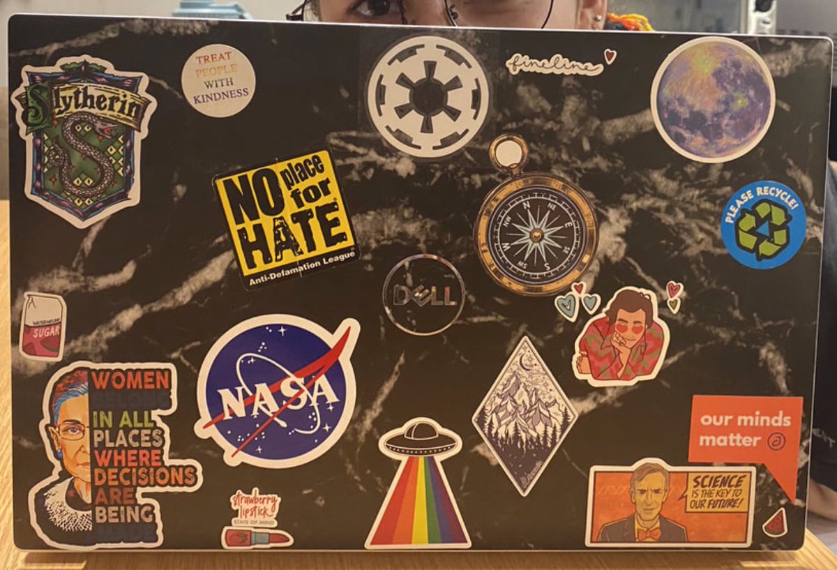 CampusTrainer's tweet photo. When it comes to laptop stickers, the more the merrier! 🤩 But, “what do they mean?” asked @lydiahurleyumd in her article below 👇 

https://t.co/5YYWLiQVwY

photos via @lydiahurleyumd https://t.co/IXSft8i7Nr
