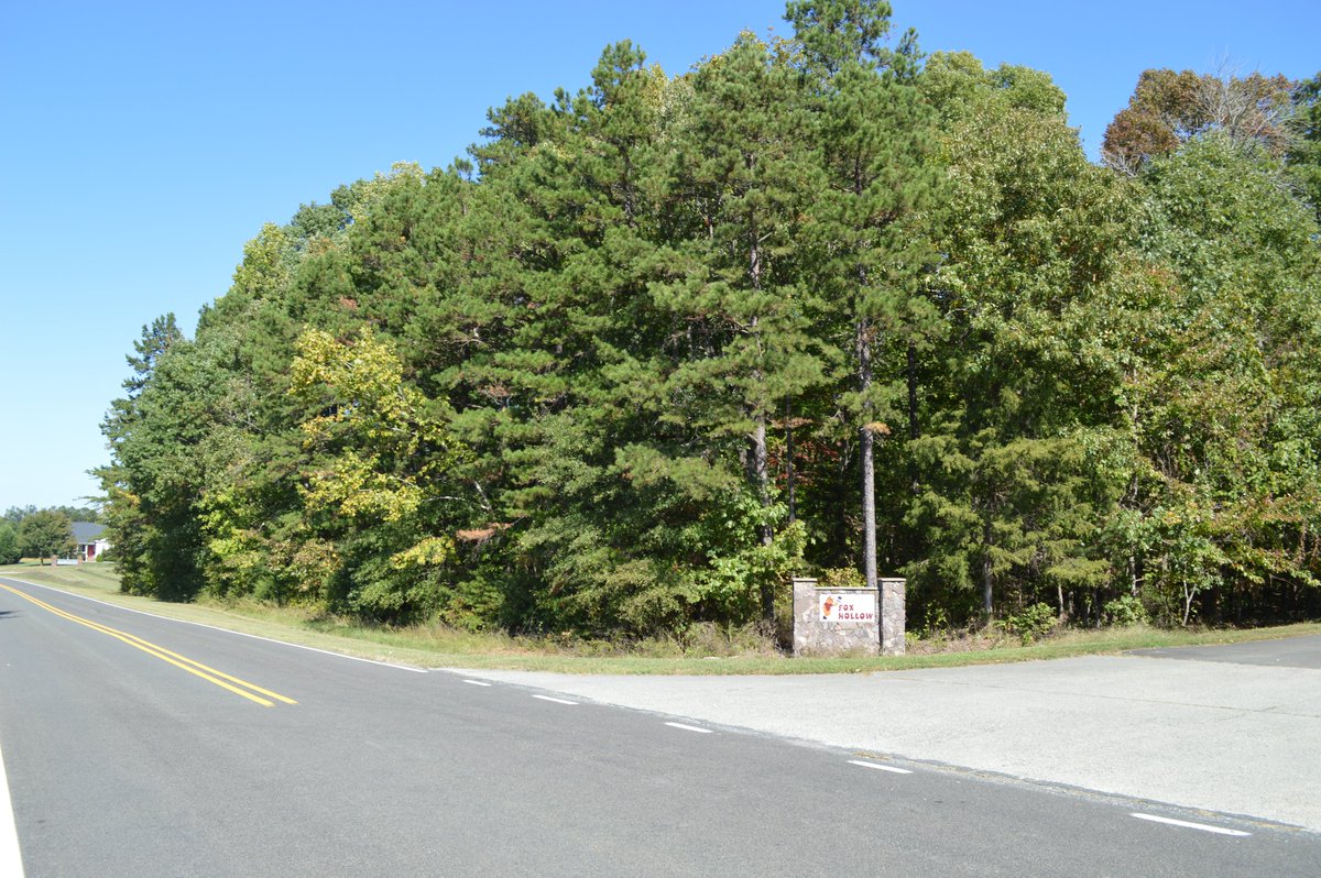 Corner wooded lot for sale in Person County. Road frontage on Maurice Daniels.  $22,000