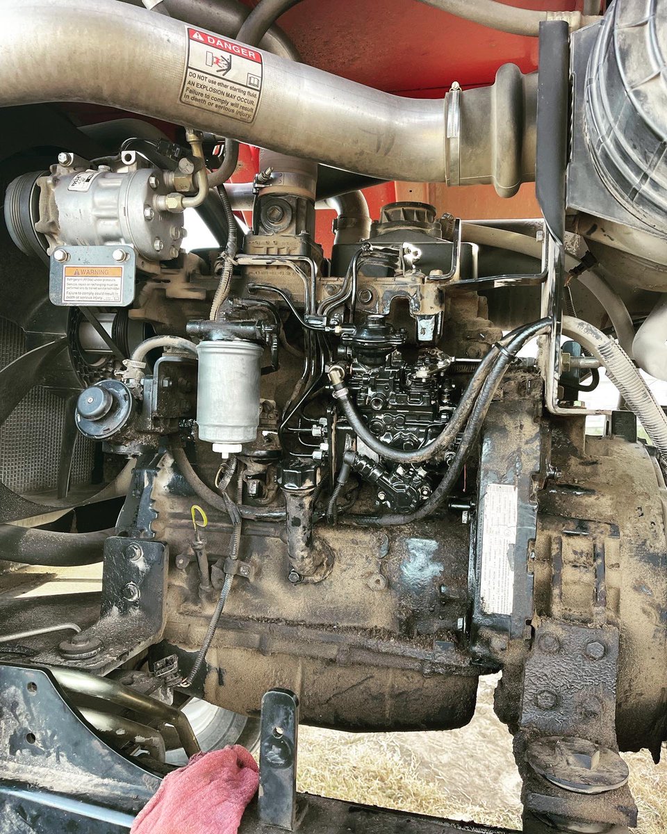 JPTractortech's tweet photo. Installing an Injection Pump in a CaseIH WD1203 Swather makes for an interesting service call. #ilovemyjob #CaseIH #raisedred #kansasharvest #farming #farmingred. @Case_IH @RedTractors https://t.co/0Xf8RystEM