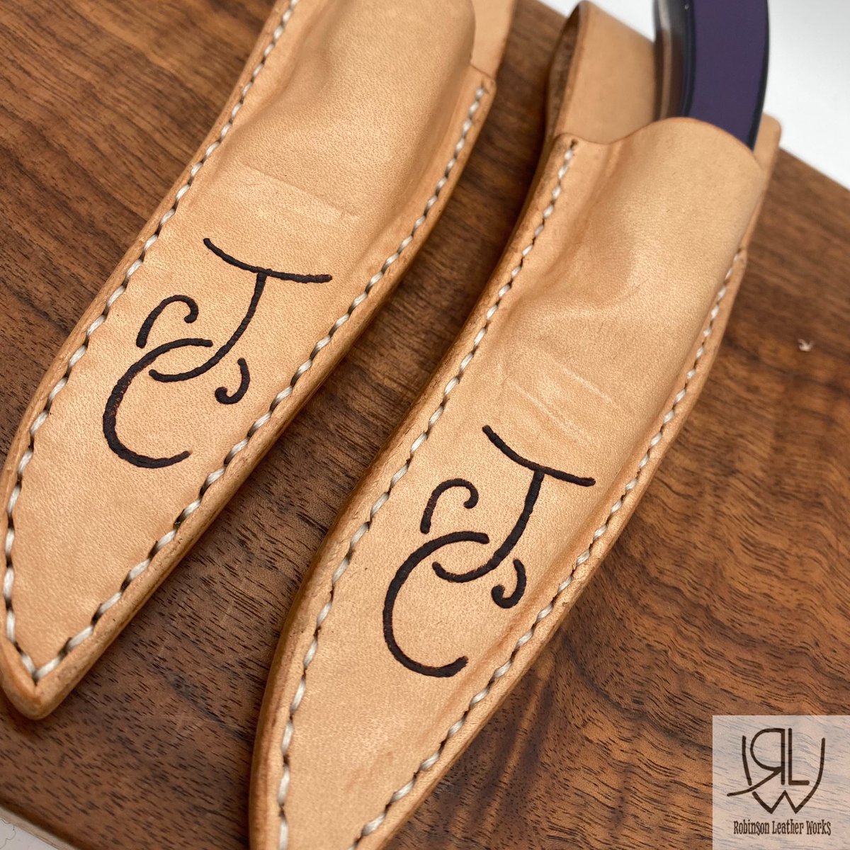 robinsonleather's tweet photo. The customer made the knife, we made the matching twin leather knife sheaths. #leather #knifesheath #handmade #custom #rlw https://t.co/JzjWbjssWo