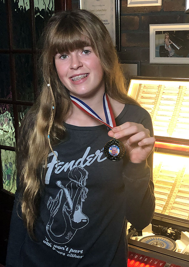 parker_yulia's tweet photo. Complete with her breakfast and on the way to a Swim Meet at 6.30 am, Nicole was so surprised to hear @tonyblackburn call her out as a winner of his ’Nearly Gold Medallion” on his Radio 2 show ‘Sounds of 60’s’  recently. It was the best medal she won that day ! 
@portsmouthhigh https://t.co/L2lQXk5ITC