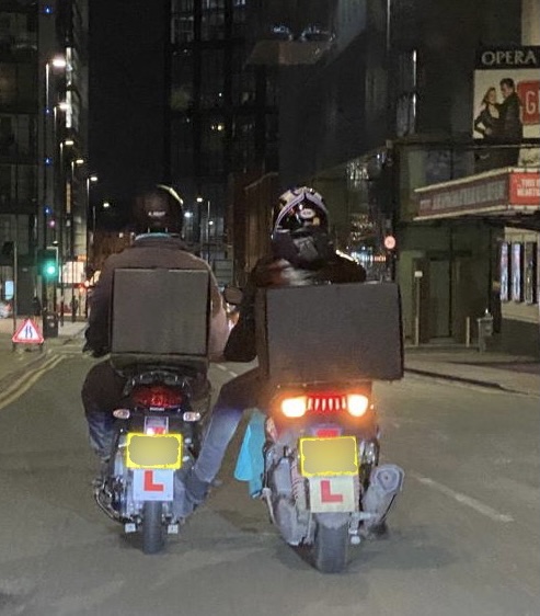 gmptraffic's tweet photo. These delivery riders were literally kicking each other down the road @GMPCityCentre. Wobbling all over the place, travelling at speed and almost falling in front of on coming vehicles. Apparently they were towing each other 🤔 Stopped by #XT84 and reported #fatal4 https://t.co/EeUaCzvQfa