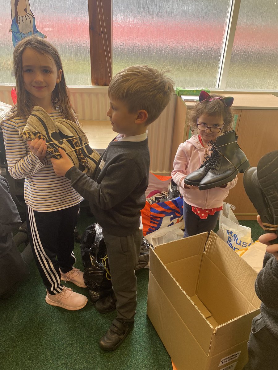 HolyCrossNLC's tweet photo. Some Laudato Si work in action today with our Rights Respecting Group taking action for a global cause. Thank you to our school community for helping us. #globalgoals #Shoeshare @UNICEF_uk @Pontifex @LaudatoSiMvmt @rercag https://t.co/i59qlQ0efF