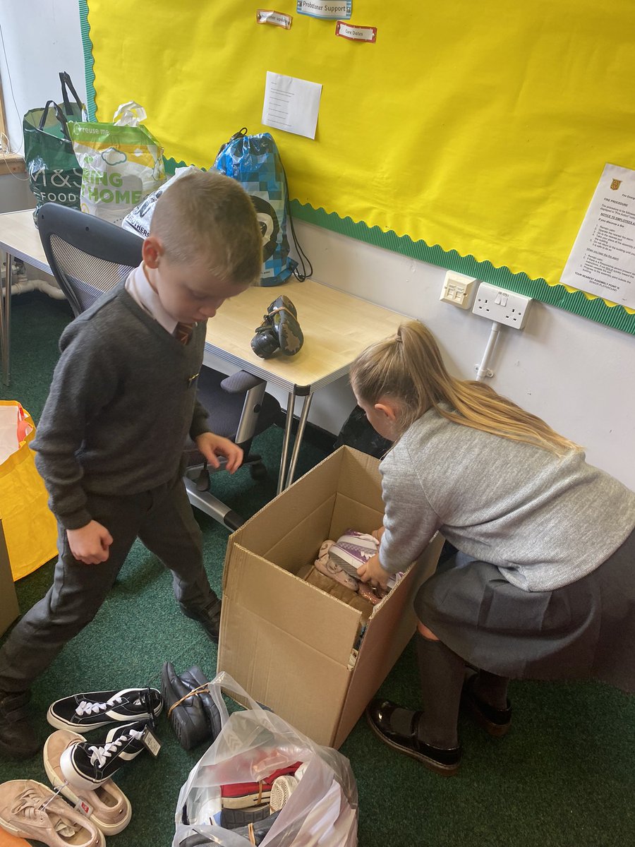 HolyCrossNLC's tweet photo. Some Laudato Si work in action today with our Rights Respecting Group taking action for a global cause. Thank you to our school community for helping us. #globalgoals #Shoeshare @UNICEF_uk @Pontifex @LaudatoSiMvmt @rercag https://t.co/i59qlQ0efF