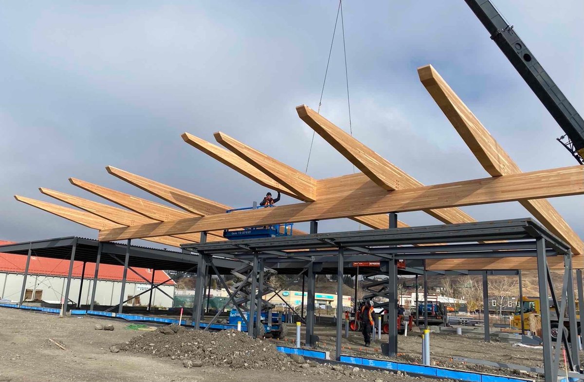 Beam_Craft's tweet photo. This @gecarchitecture and @rjc engineering design features #glulaminated beams as part of the roof structure. We needed some help from our most respected friends from Schuler Timberworks Inc. to get this installed on time for @CANAyyc and @WesternArchrib. Thanks David and crew! https://t.co/ScTIdXRvrr